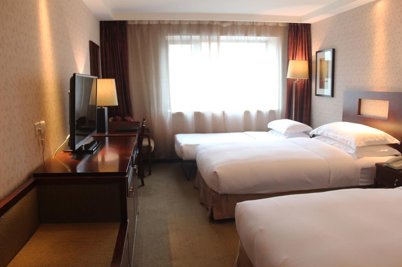 فندق بكينفي  فندق صن ورلد وانغفوجينغ الغرفة الصورة